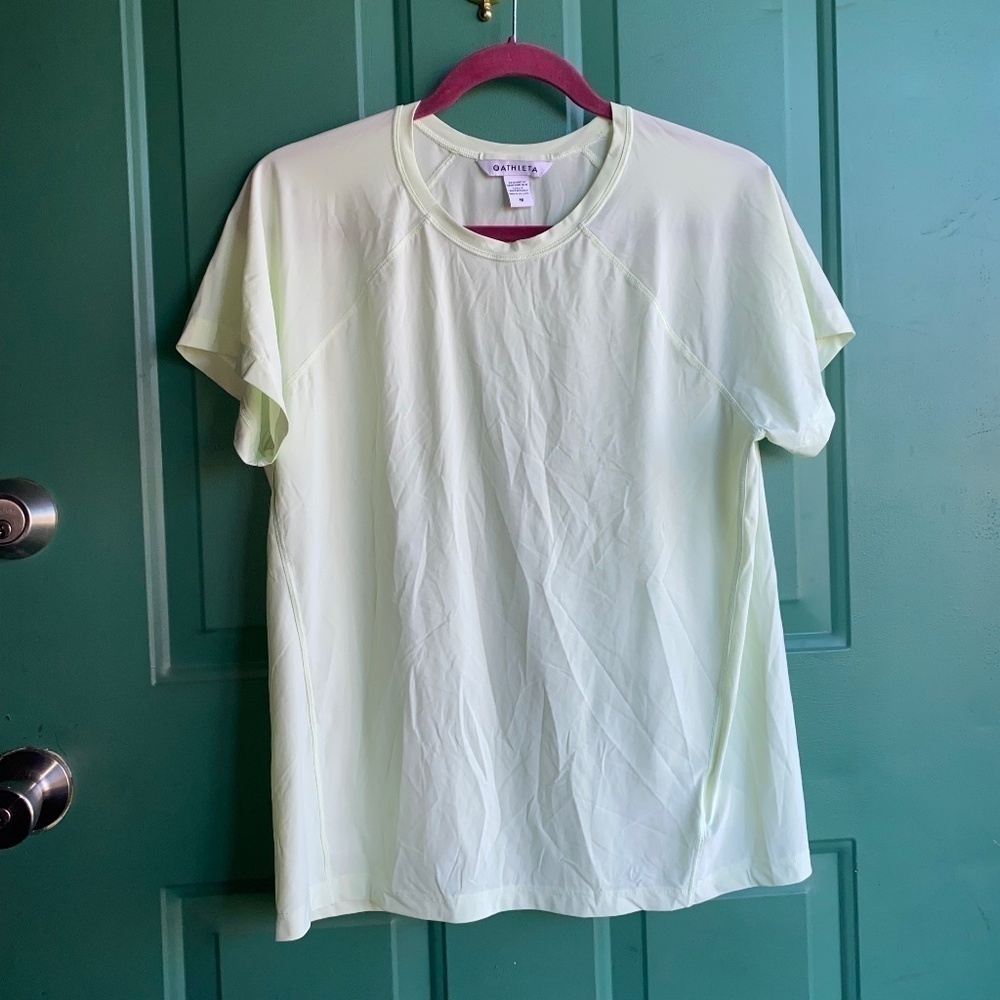 Athleta size medium light green ladies athletic shirt